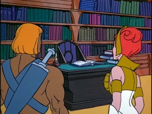 He-Man and Teela at the palace library